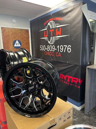 United Tires and Wheels banner with a black off-road wheel
